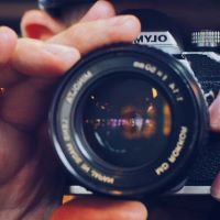 Photo of a person staring into a camera