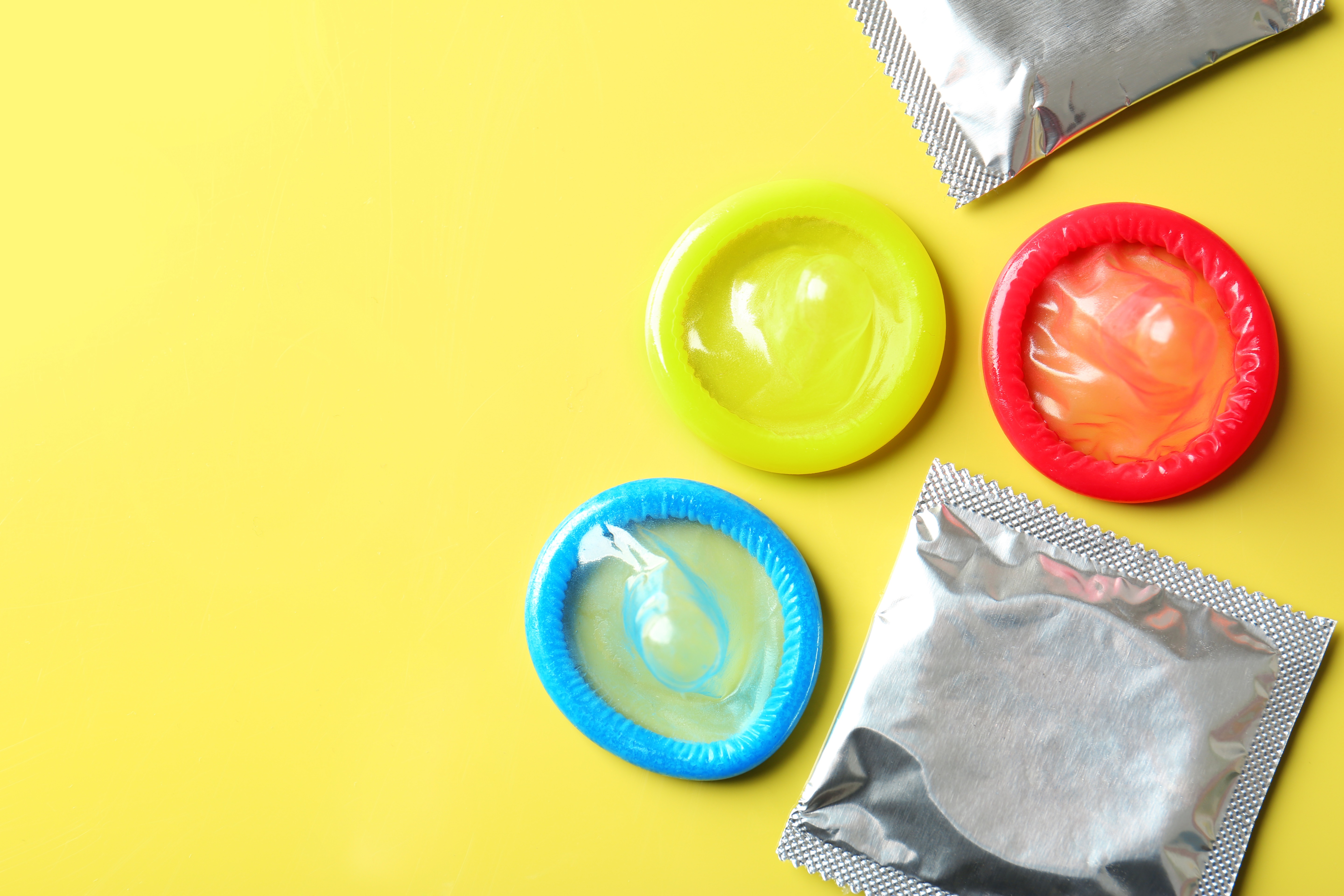 three condoms with foil wrap