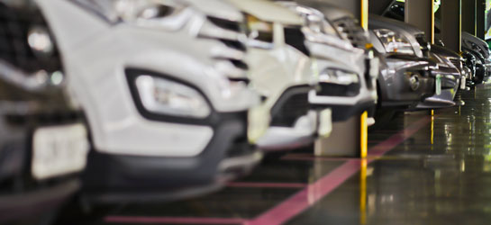 Image of parked cars in a covered garage