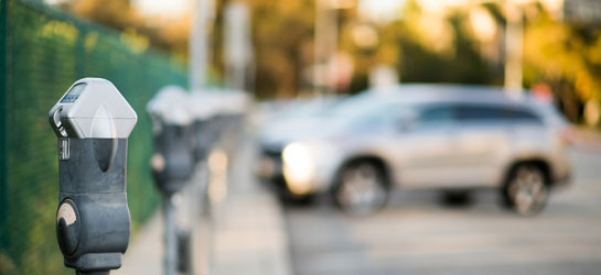 Image of empty lot and parking meter