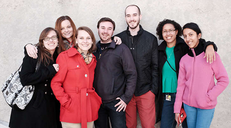 Students from the University of Maryland Graduate School gather and smile for the camera.