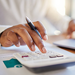 person working with a calculator