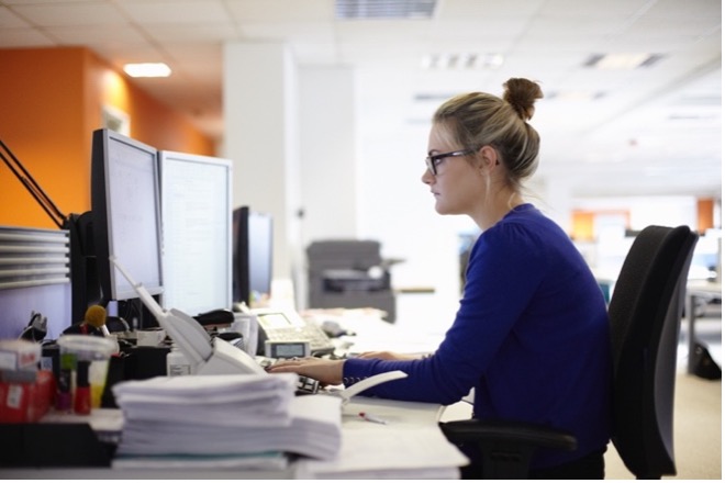 Person at a computer. Microsoft Word stock image.
